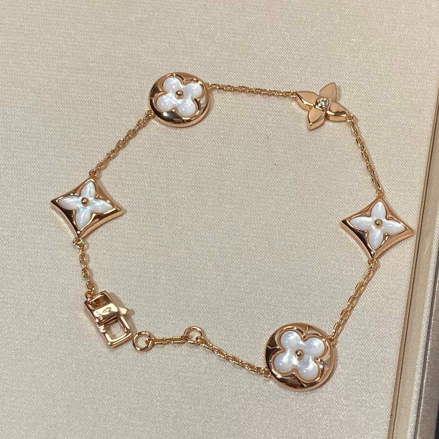 [Kincade Jewelery]STAR AND SUN 5 MOTIF MOP PINK GOLD BRACELET